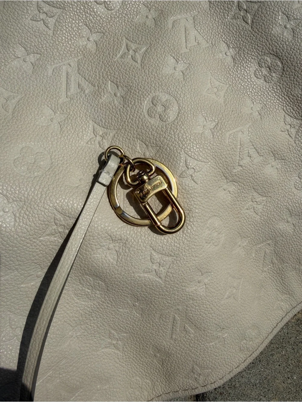 Authentic Louis Vuitton Cream Embossed Leather Hobo with Gold Hardware - Cream